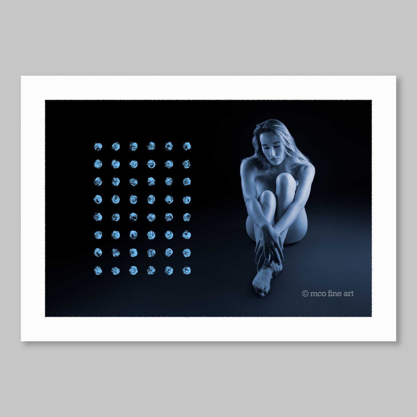 Nude figure sitting on a dark background with a grid of blue circular shapes to the left. Art by MCO.