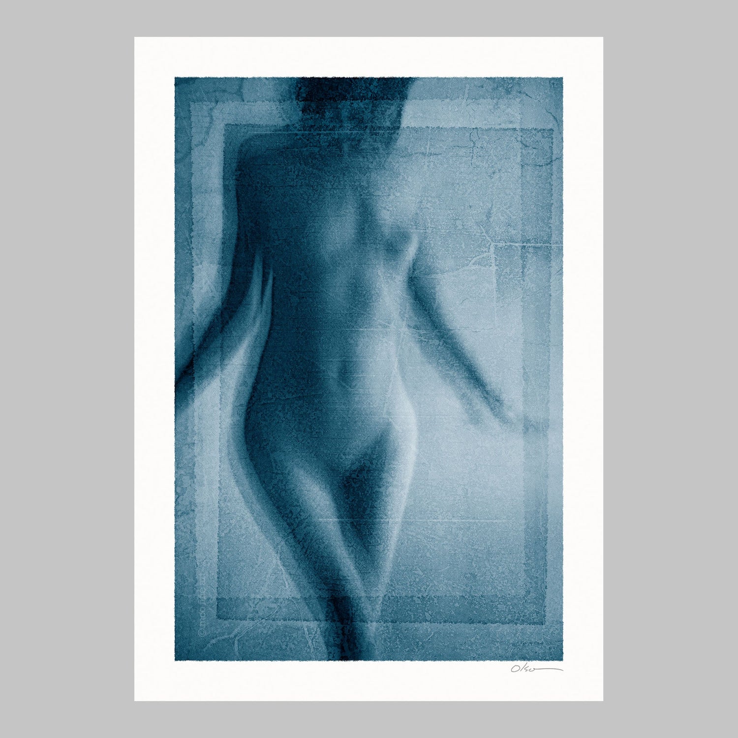A blurred, ethereal image of a nude female figure, title 'Wisp', with a blue hue and a sense of motion or soft focus. By MCO.