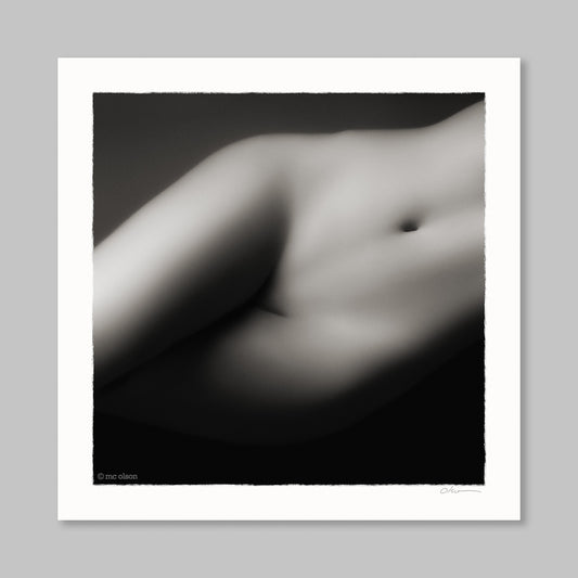 Black and white abstract art print of human hips on a gray background; has 'mc olson' copyright watermark