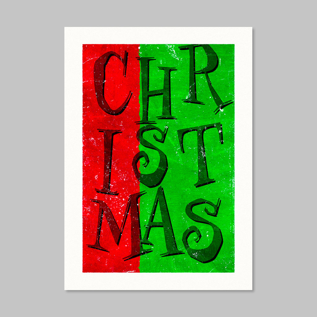 Greeting card that says "Christmas" in large font over a red and green background.
